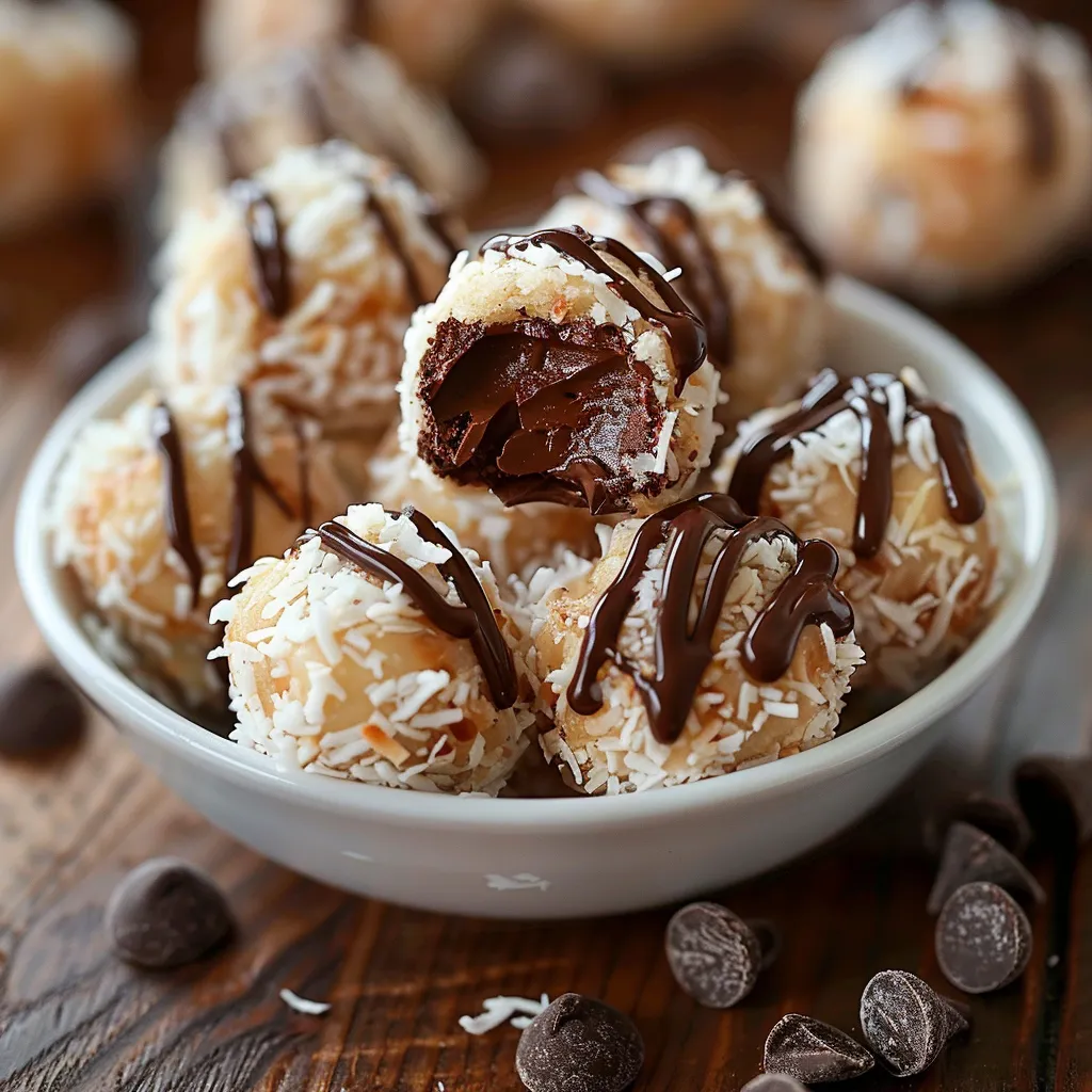 A bowl filled with chocolate-coated treats.