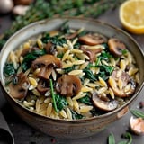 A tasty bowl of pasta with sautéed spinach and mushrooms.
